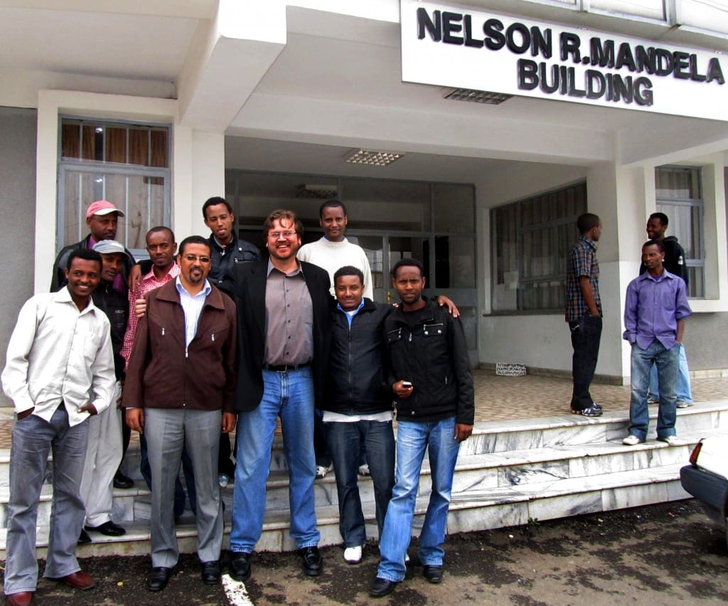 dave lafontaine and his tv production class in front of the nelson mandela building at addis ababa university